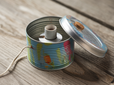 How to build a whispering box that hides a sound mechanism using cheap piezo buzzers and recycled tins